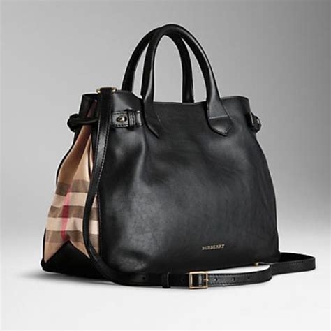 black leather burberry handbag|More.